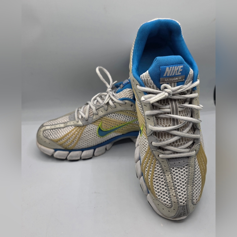 Nike Woman's Size 9.5 Skylon 11 White, Blue, Yellow & Green Athletic Sneakers